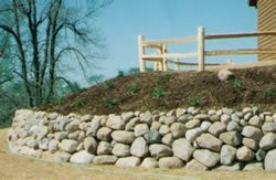 A 4 foot high by 15 foot long retaining wall could be holding back as much as 20 tons of soil.